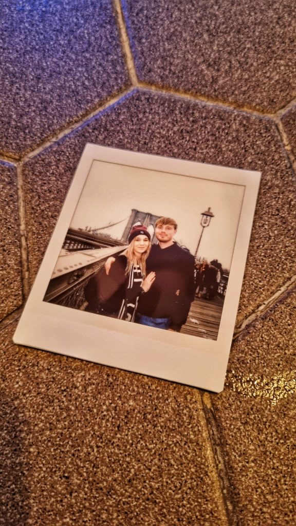 The polaroid photo that we got taken whilst we were on Brooklyn Bridge.
