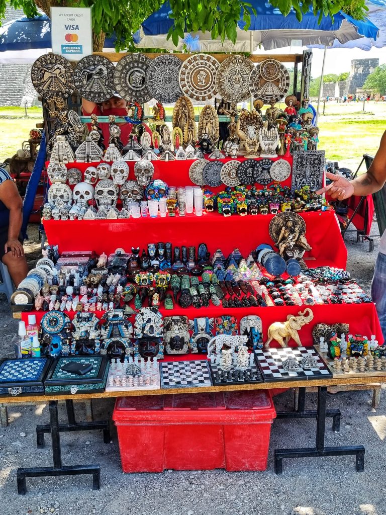 Souvenirs that you can purchase at Chichen Itza including chess boards, elephant statues, aztect calendars and much more.