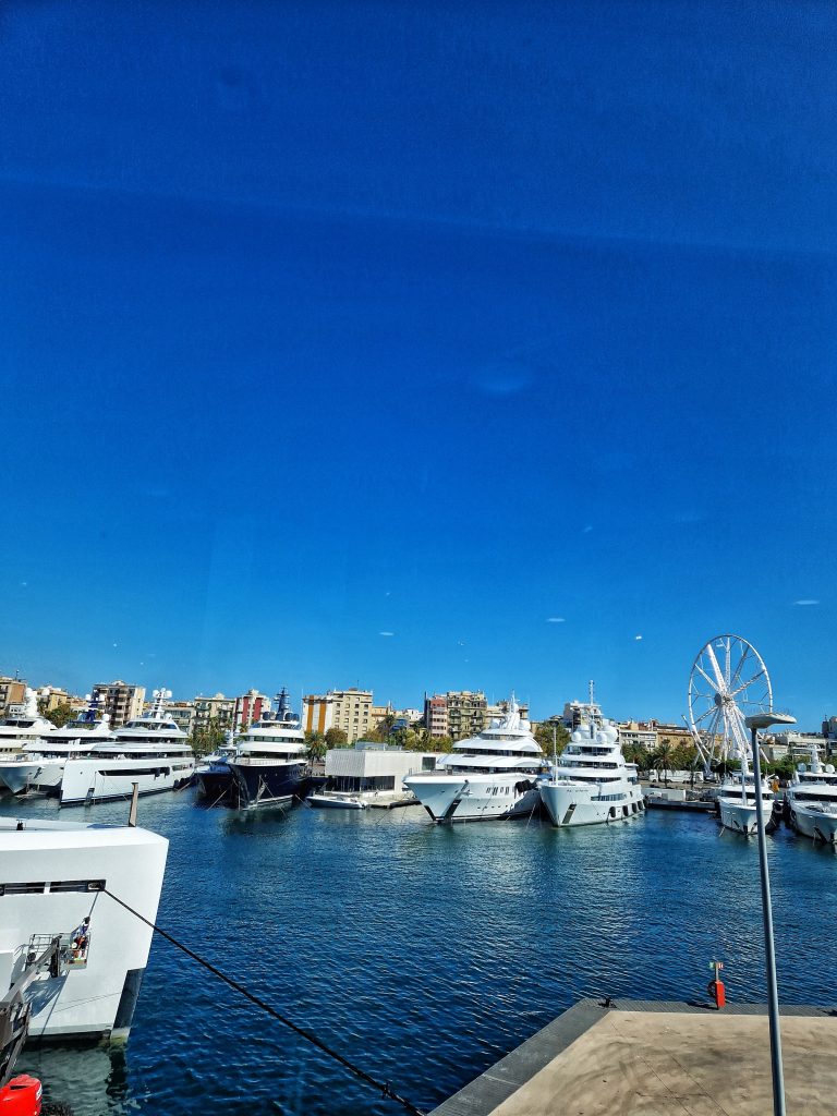 Barcelona Marina with plenty of boats on the water.