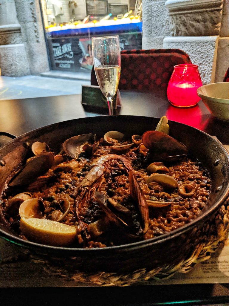 Amy enjoying some tasty Paella in Barcelona.