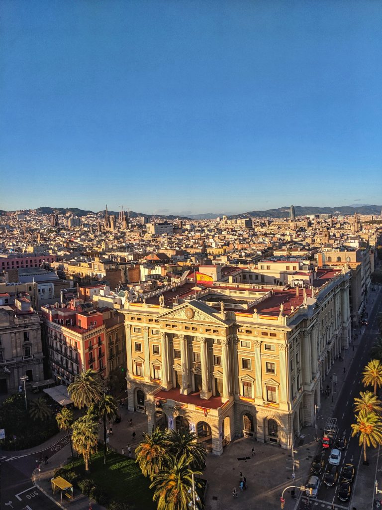 Image of the viewpoint from the Christopher Columbus monument showing some of the beautiful buildings in Barcelona.