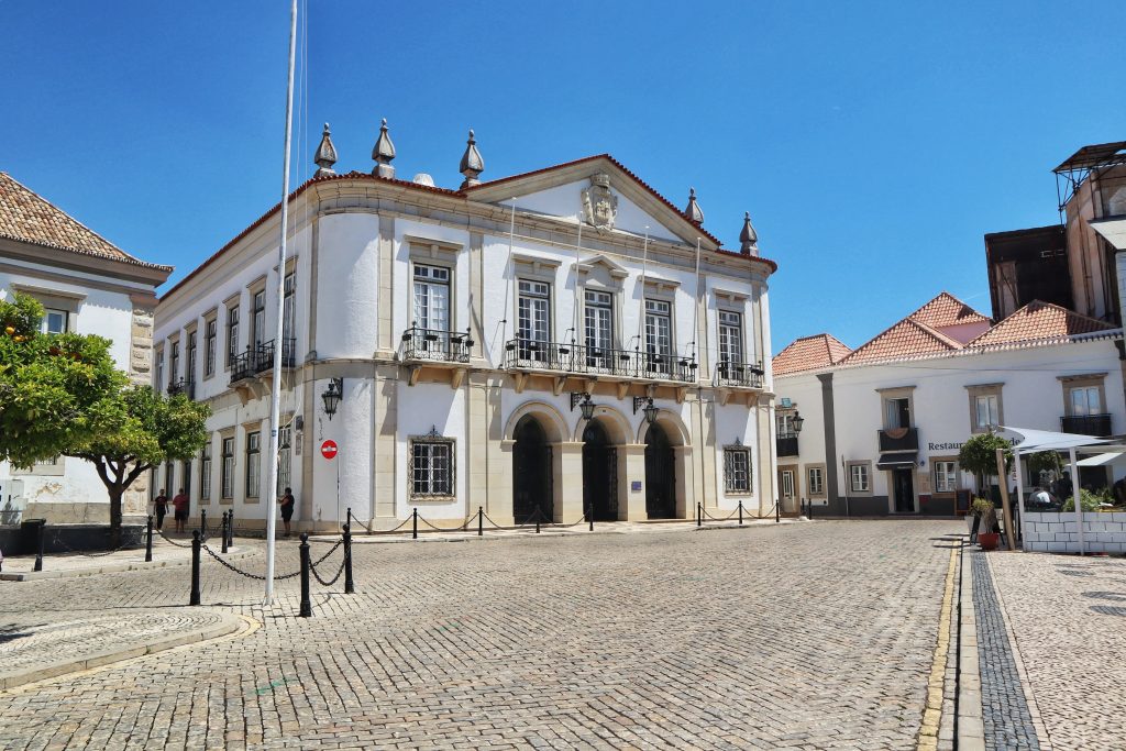 One of the beautiful buildings in Faro Old Town which shows the cobblestoned streets and the beauty of the old city.
