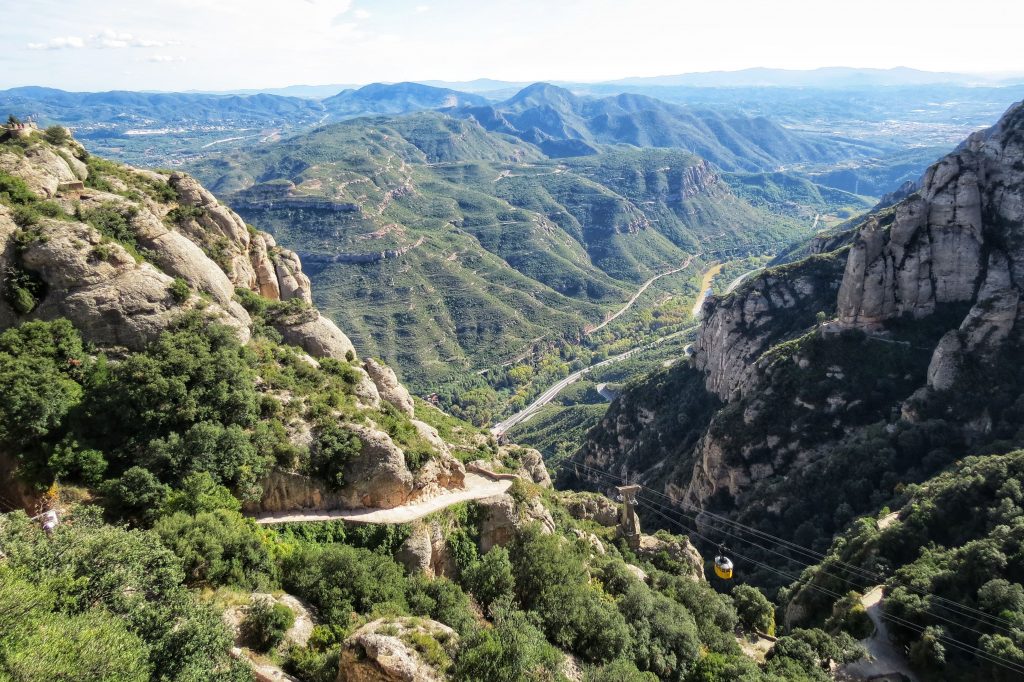 Viewpoint from Montserrat. You can see the cable car coming up the mountain which is one of the ways on how to get to Montserrat from Barcelona.