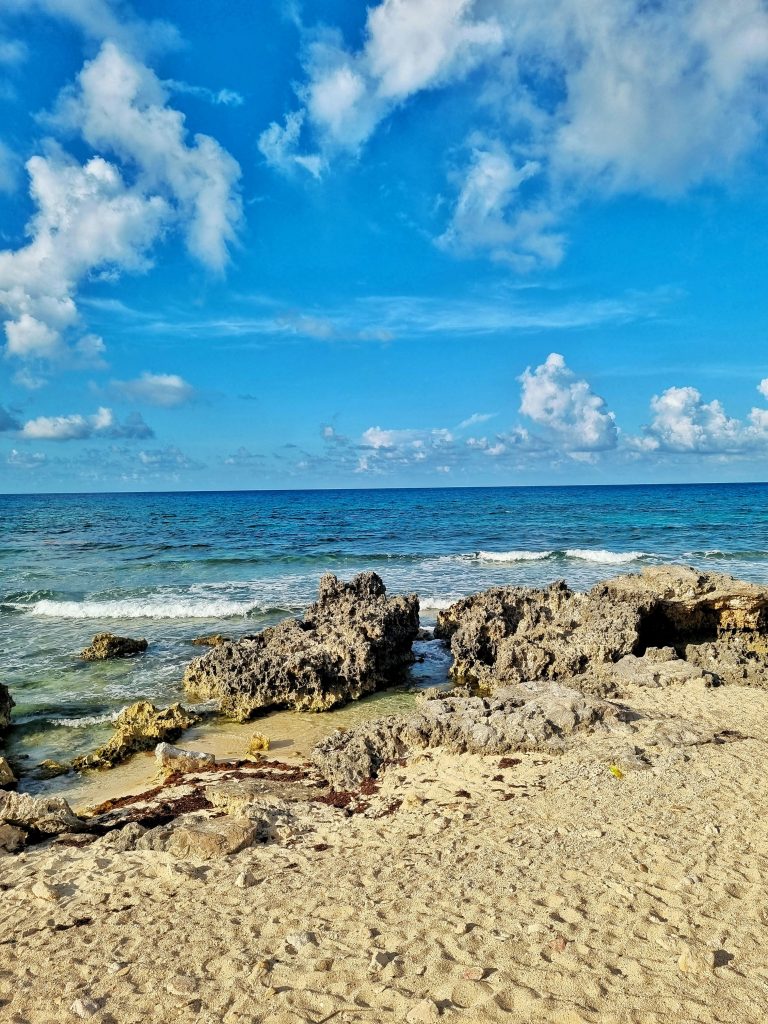 One of the beaches in Isla Mujeres which is perfect to spend some relaxing time listening to the waves crash against the rocks.