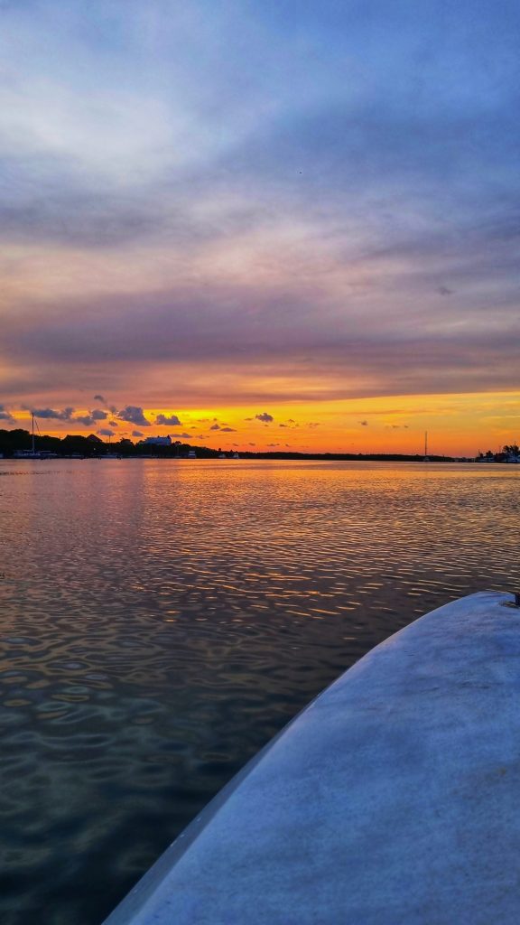 Seeing the sunset in Isla Mujeres is one of the most epic things to do on the island.