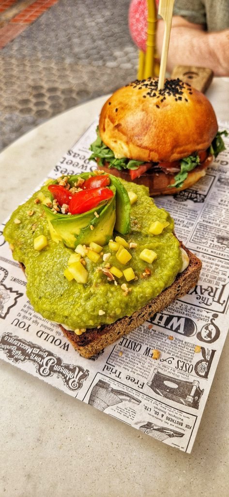 Teriyaki Chicken Avocado Toast & Ham breakfast roll that we got at La Cacharreria. This is a breakfast place that you need to add to your 3 days in Seville itinerary.