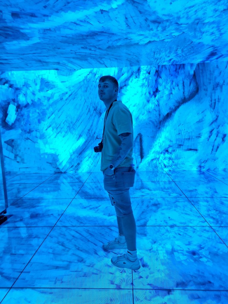 Liam inside Gaudi's cube which is an interactive display within Casa Batllo.