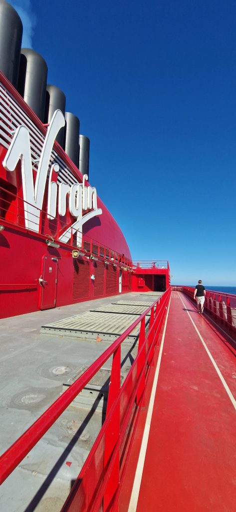 Virgin Voyages top deck with running track.