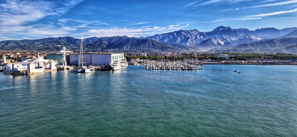 Marina di Carrara port with beautiful views of the mountains at the port stop.