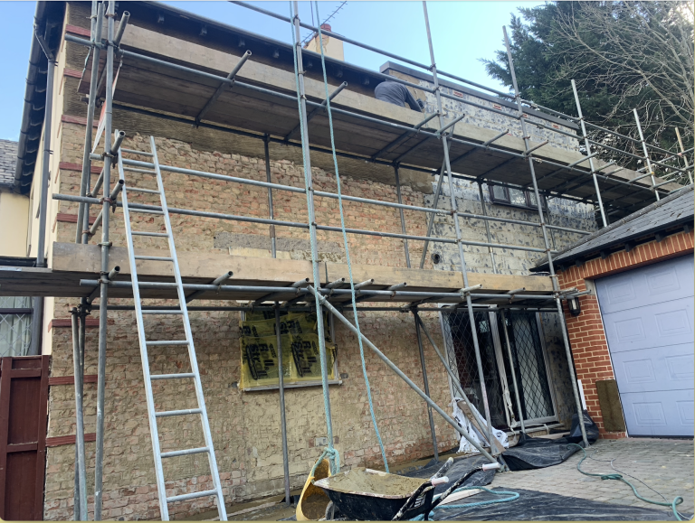 plaster stripped back to bricks