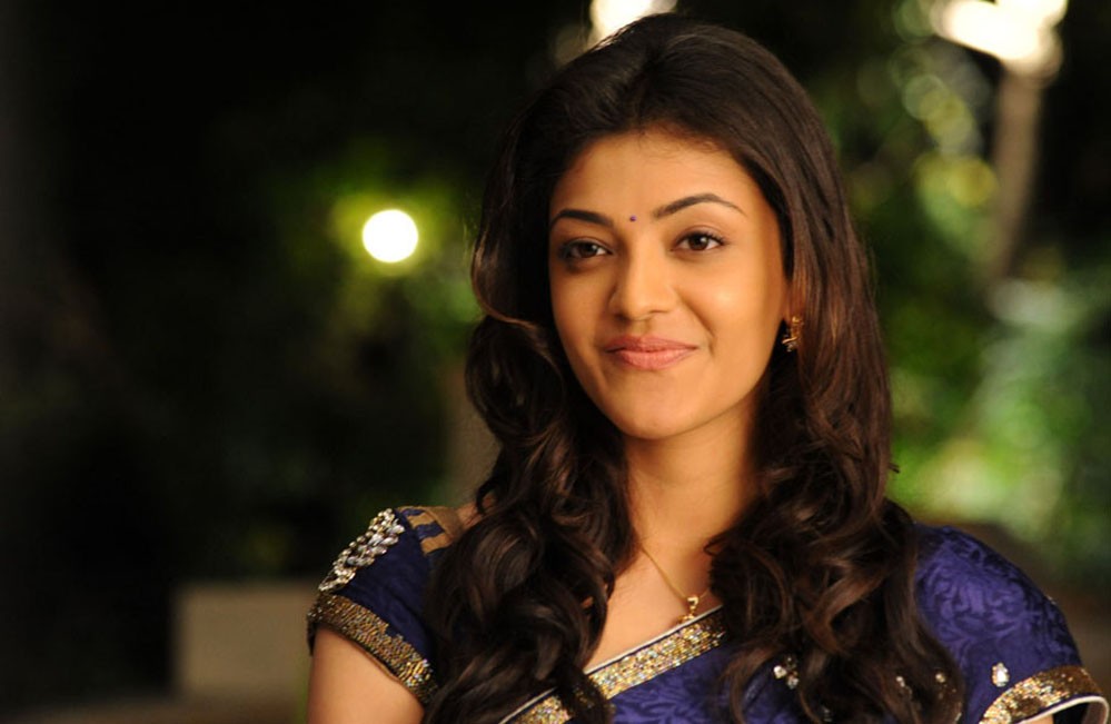 Kajal Aggarwal smiling in saree