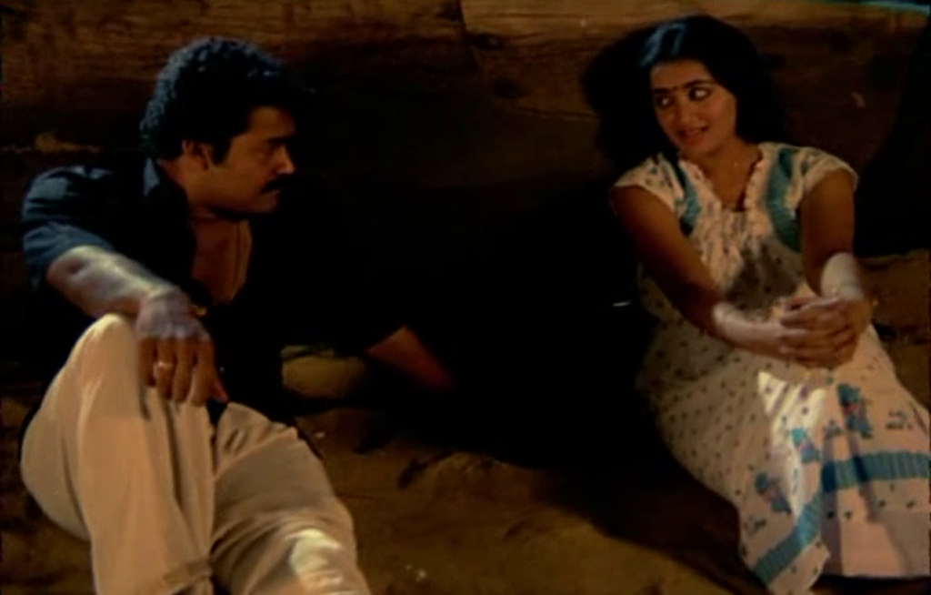 Mohanlal and Sumalatha in Thoovanathumbikal at a Beach