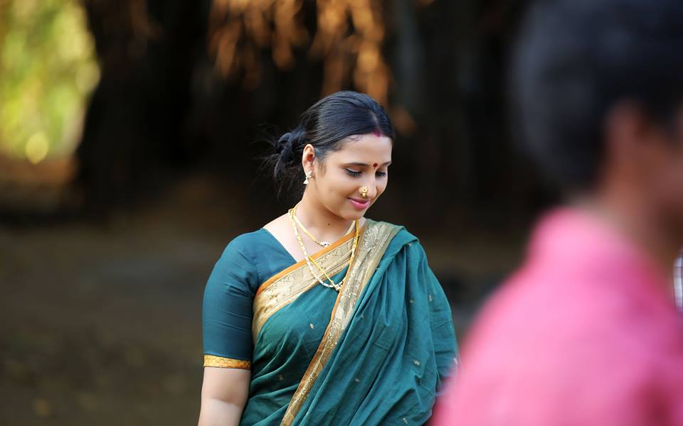 Actress Jeena Raju in green saree