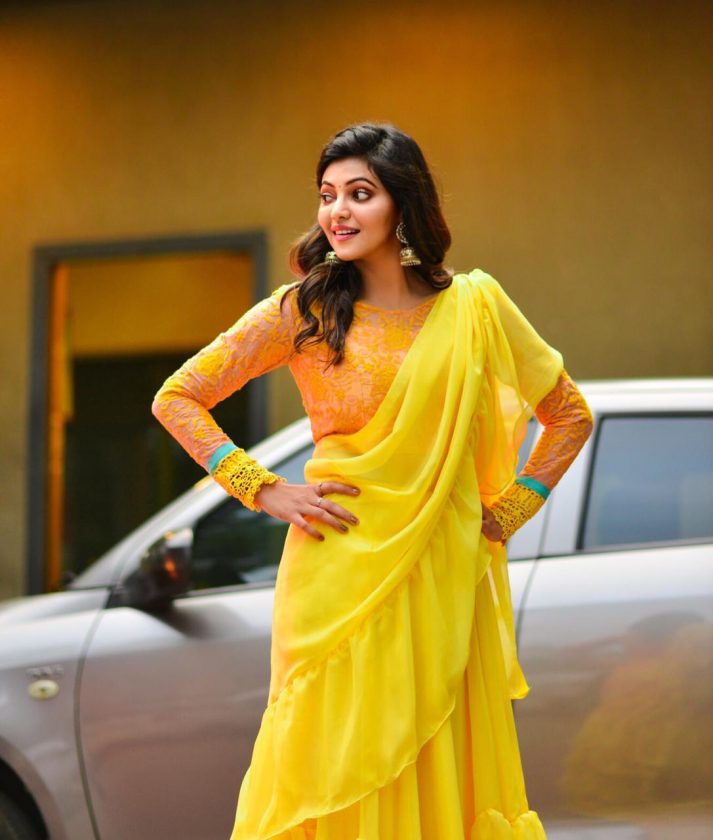 Athulya in Yellow and Orange