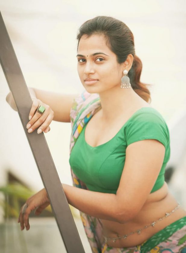 Hot Tamil actress Ramya Pandian on roof top during a photoshoot