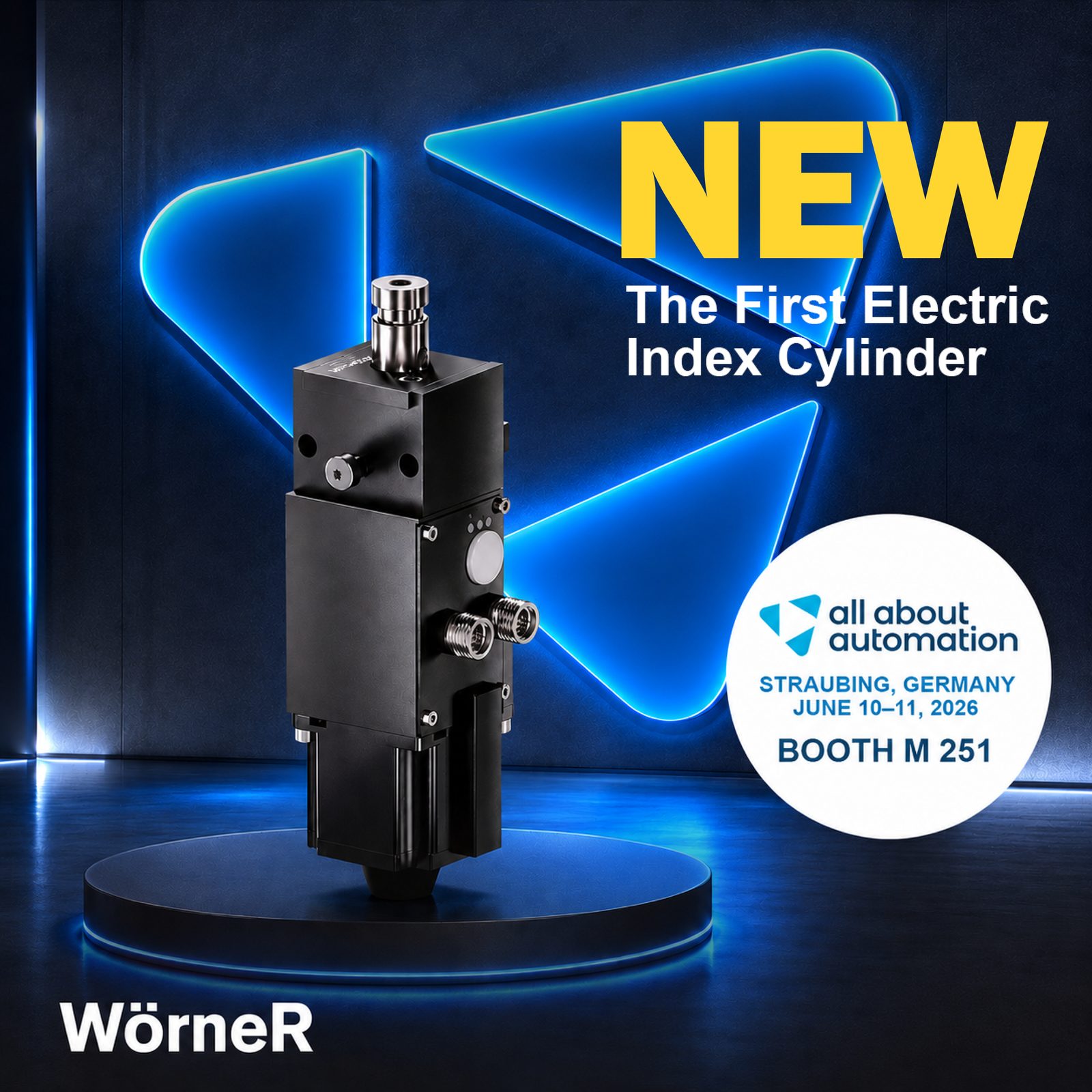 Woerner's first electric index cylinder on a dark stage, presented as a new product launch