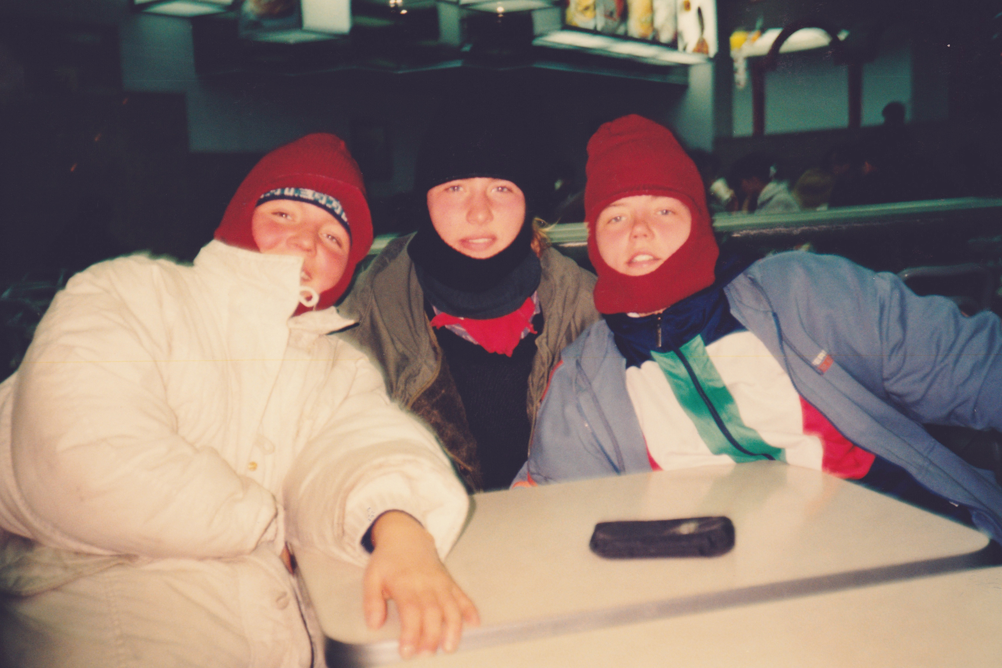 three women with weird hats in macdonalds beijing