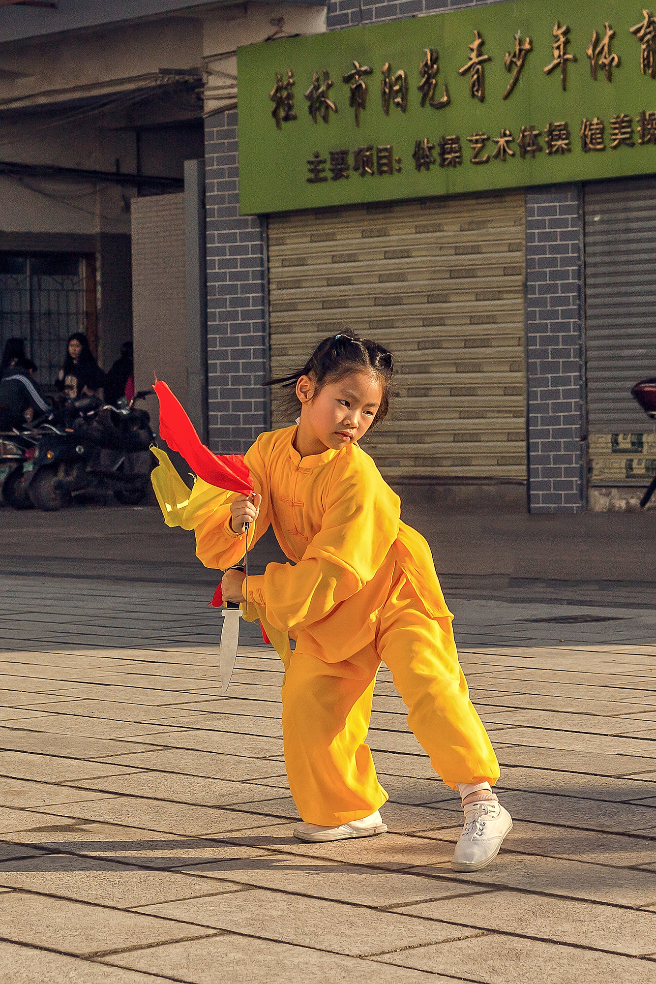 girl praciticing tai chi in guilin