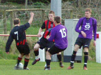 Presteigne St Andrews FC A midfield tussle in Wednesday night's derby game