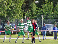 Danny Ives surrounded by Hay players during the Sparey Cup final win