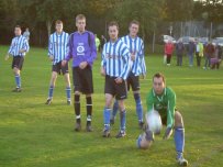 Dave Exhall gathers the ball during the first league meeting between the sides