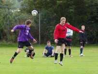 Mark Ammonds wins a header in the home meeting with Sennybridge