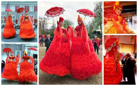 Ervaar betovering met Rode Koninginnen Steltenlopers: LED-gloed, veelzijdig inzetbaar op elk evenement! Boek nu voor vuurrood spektakel!