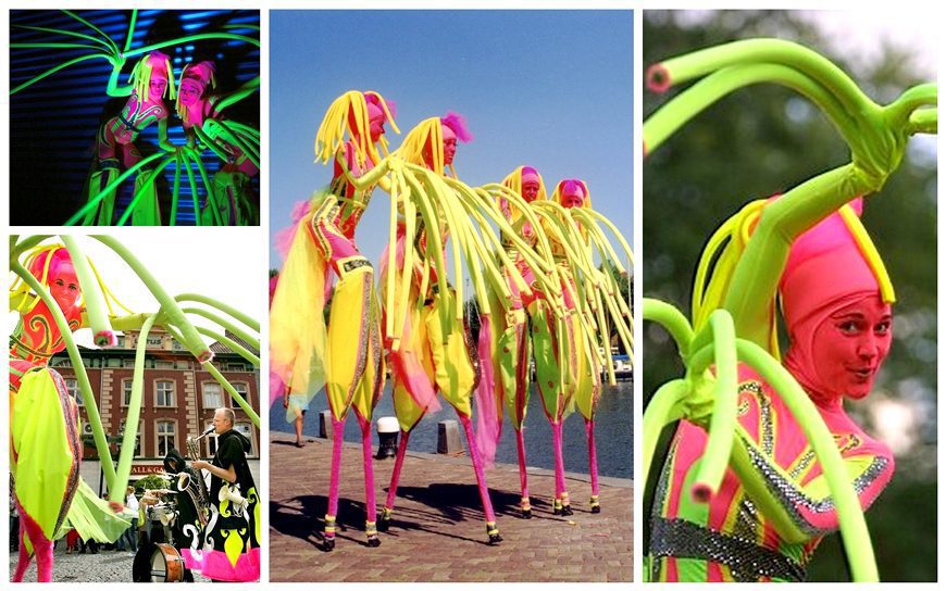 Ervaar betoverende Fluor Steltenlopers: Mysterieuze elegantie en kleurrijk spektakel op uw evenement! Laat uw gasten verwonderen.