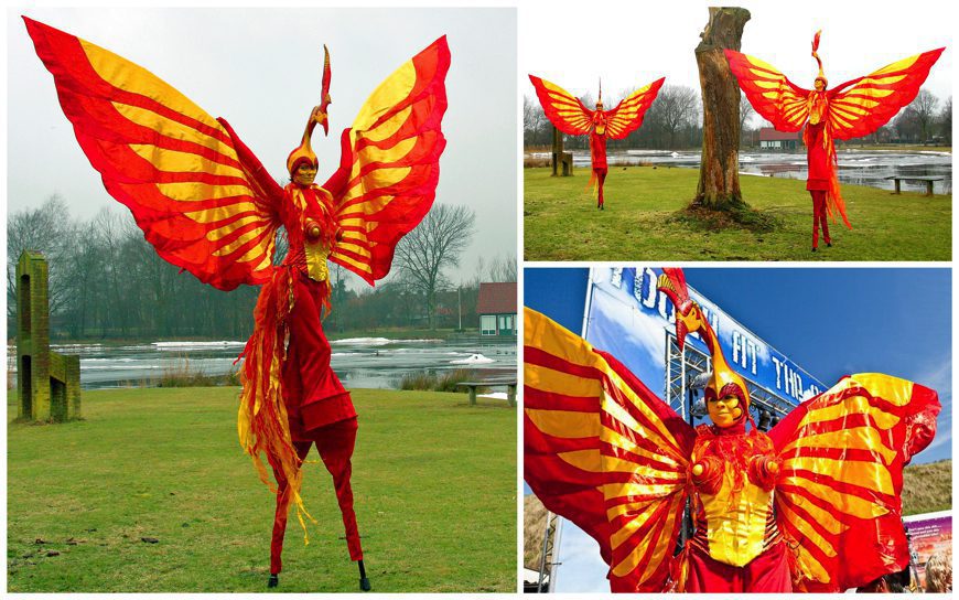 Betoverende Rood Gele Vuur Vogels Steltenlopers: Laat uw evenement ontvlammen met een vurig spektakel van kleur en charisma. Boek nu!