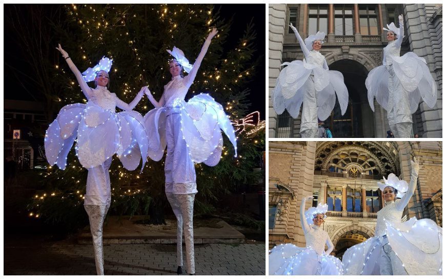 Betoverende Witte LED Bloemen Steltenlopers. Betoverend Kerst- en Wintervermaak met Majestueuze Steltenlopers. Voeg Magische Lichtsfeer Toe aan Uw Evenement!