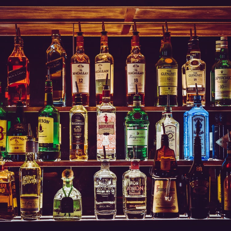 alcohol on the shelves in a bar