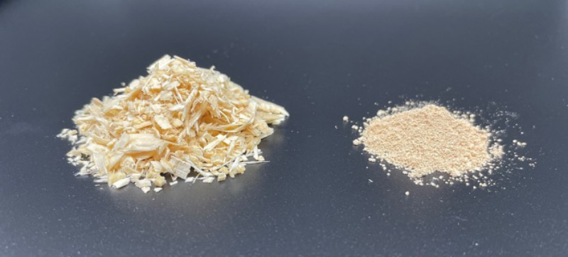 Saw shavings and extracted lignin side by side