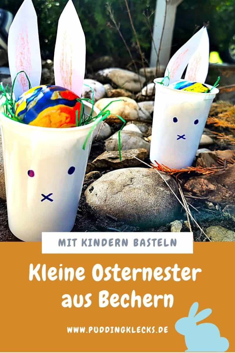 Kleine Osterhasenkörbchen aus Bechern - ein einfaches DIY zum Basteln mit Kindern für Osternester aus einfachen Materialien zu Ostern. #ostern #osternest #basteln #bastelnmitkindern #mitkindernbasteln #diy #mamablogger_de #osterzeit #upcycling