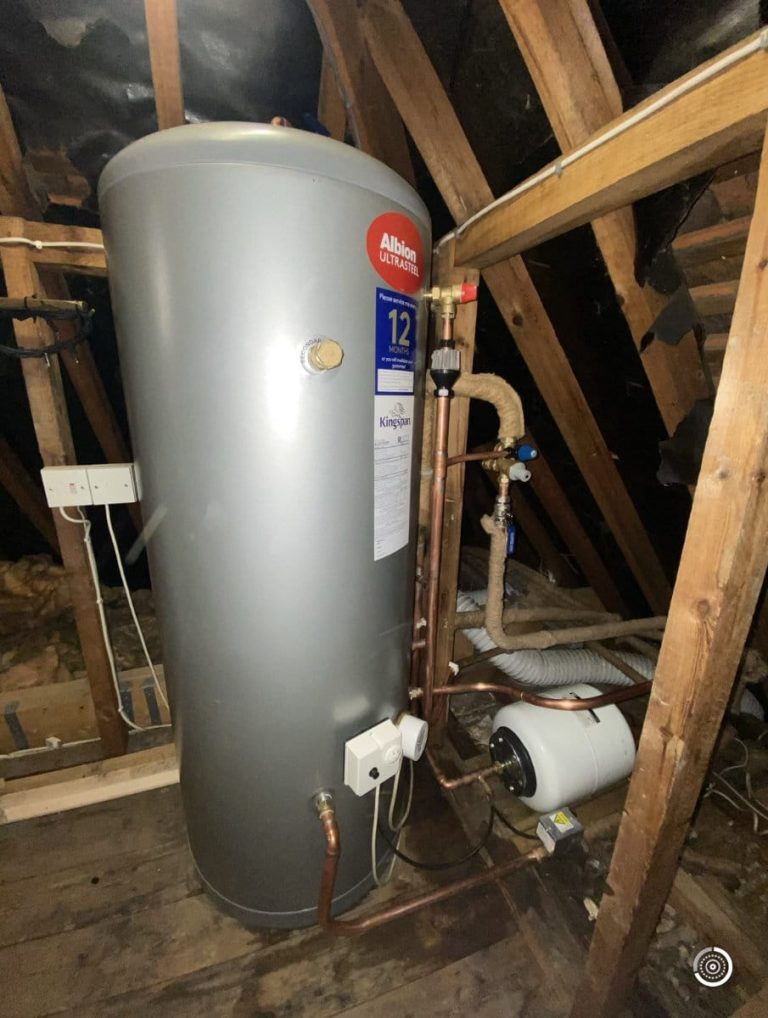 Boiler and cylinder replacement in a roof in Reading.