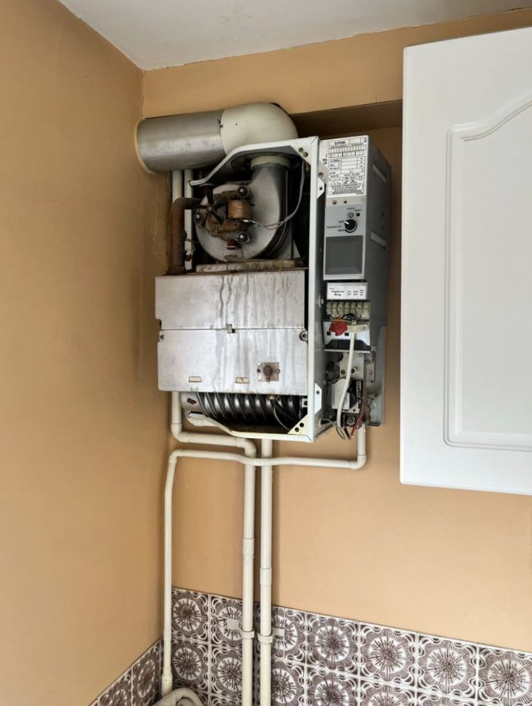 Our plumber is fixing a heating system in a local Reading home.