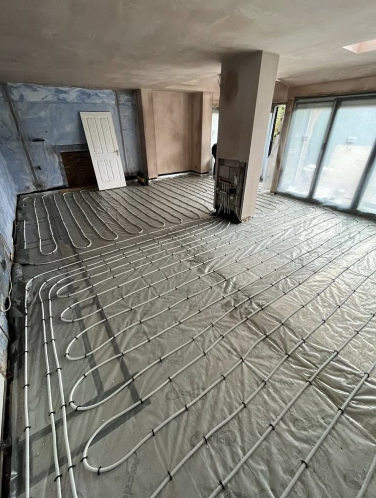 Floor heating being installed by our plumbers in Reading.