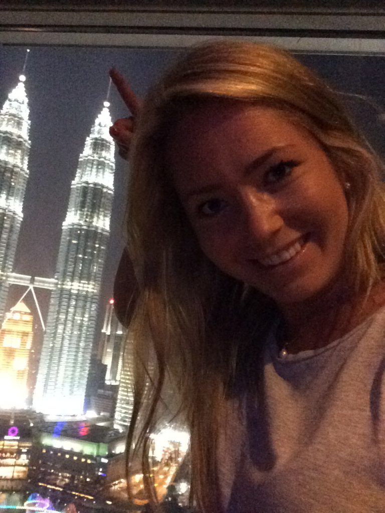 a picture of me at twin towers in Malaysia