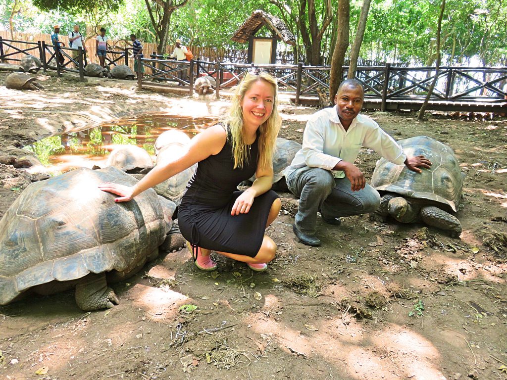 a picture of me with the caretaker of tortoises