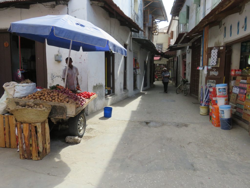 a street and vegetable seller