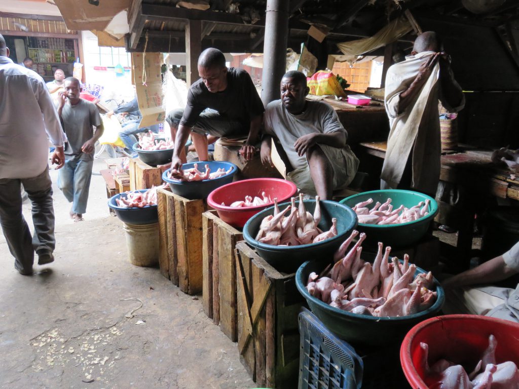 meat stall with chickens on display