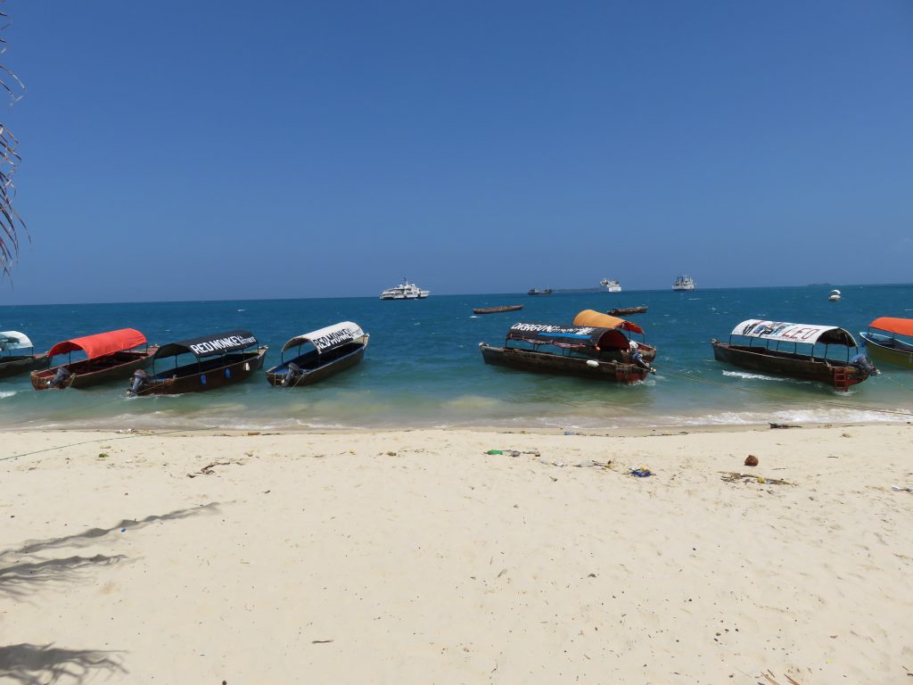 a picture of boat taxi on the beach