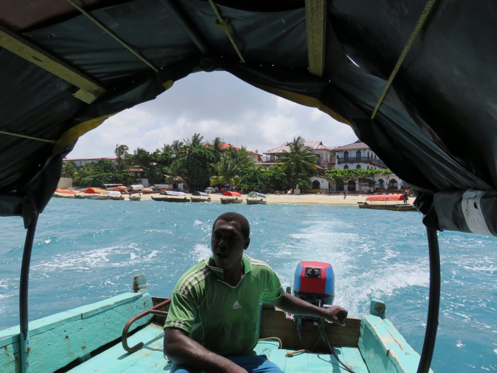 a picture of the boat captain driving the boat