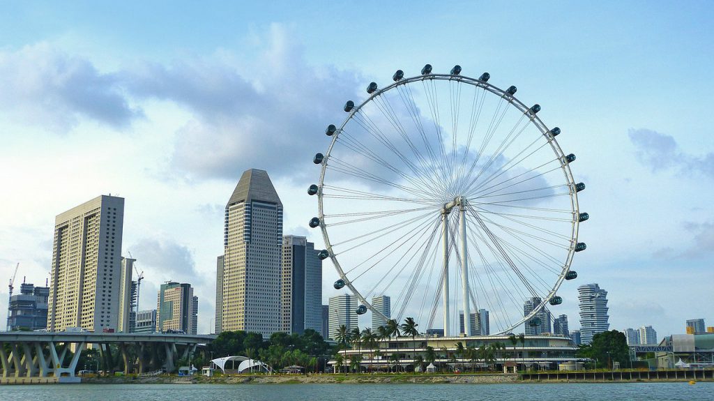 a picture of Singapore Flyer from across the water