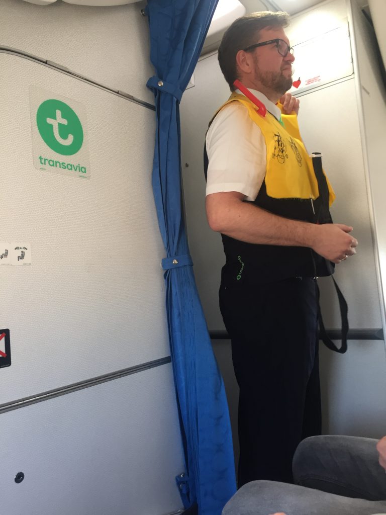 a picture of a crew member showing the safety tips