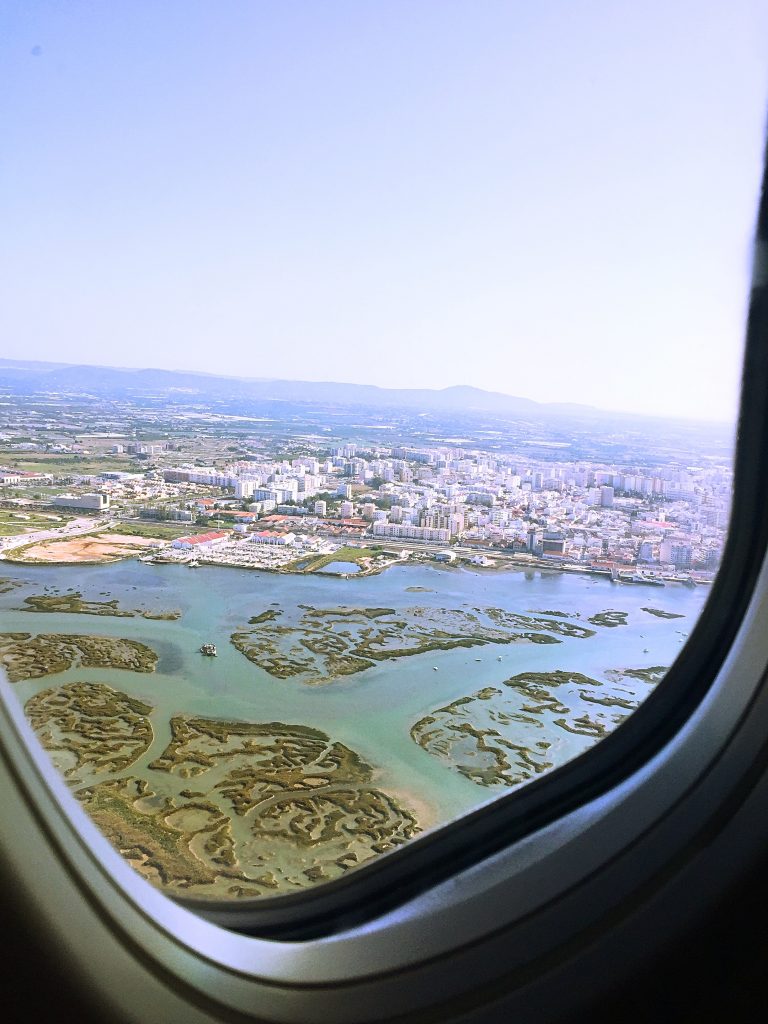 a view of the sea before landing