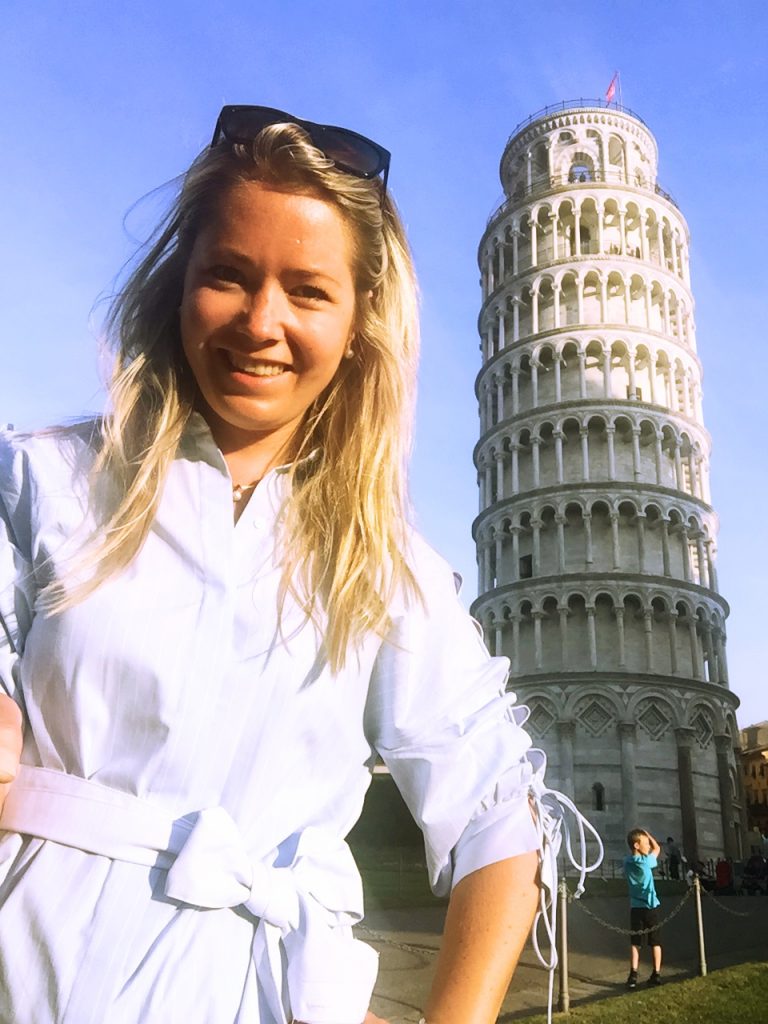 a picture of me in from of the tower in Pisa