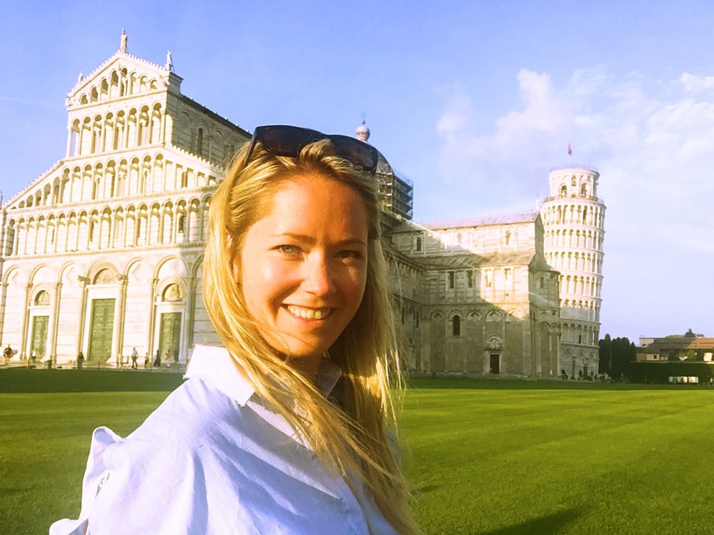 a picture of me in front of the chapel in Pisa