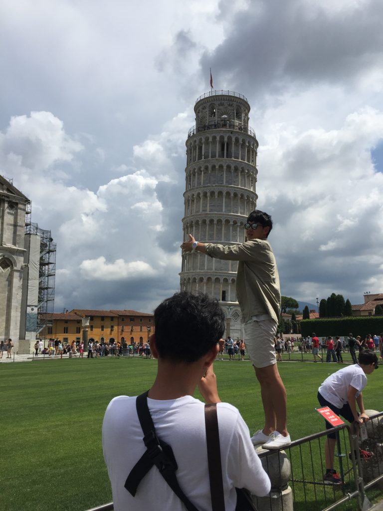 a picture of tourists taking funny pictures 