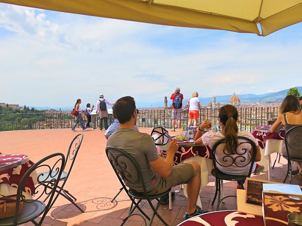 A picture of tourists relaxing and enjoying the view