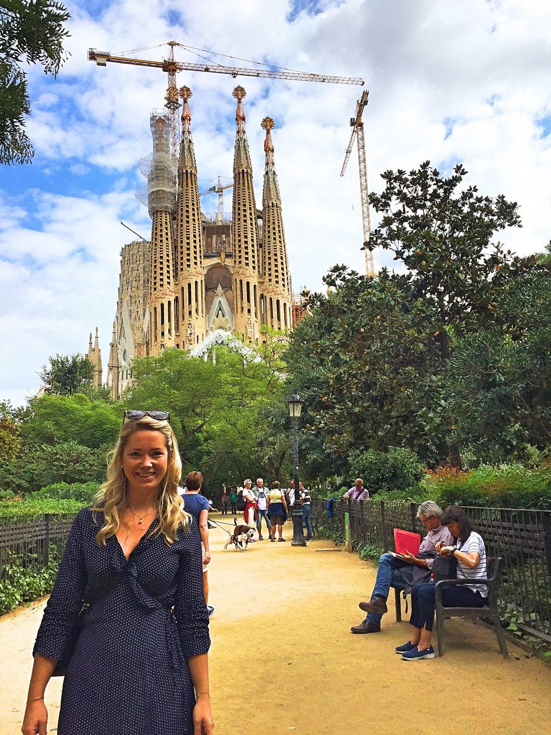 A picture of me with La Sagrada Familia being renovated